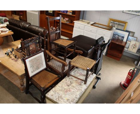 A carved oak and upholstered elbow chair, a carved and cane seated dining chair, a loom ottoman, a string seated stool, a Cor