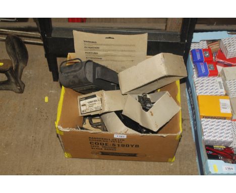 A box containing a vintage lamp, G-clamp and two smaller boxes of tower bolts