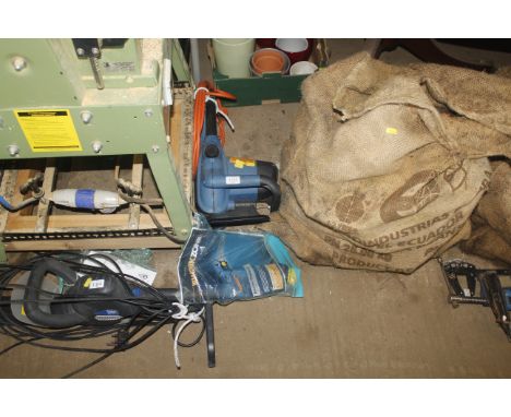 A WorkZone corded electric chainsaw with instruction manual