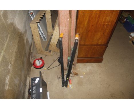 A small quantity of garden tools to include rake, loppers, Wolf tool head etc.