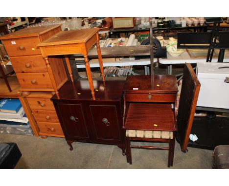 A reproduction mahogany cabinet, side table, reproduction side table an oak tray and a book shelf