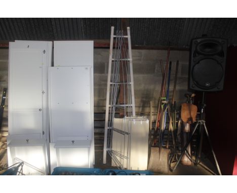 A towel ladder together with metal and beech shelving