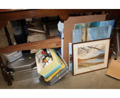 A quantity of various artists materials to include paints, easel, together with a quantity of various unframed paintings