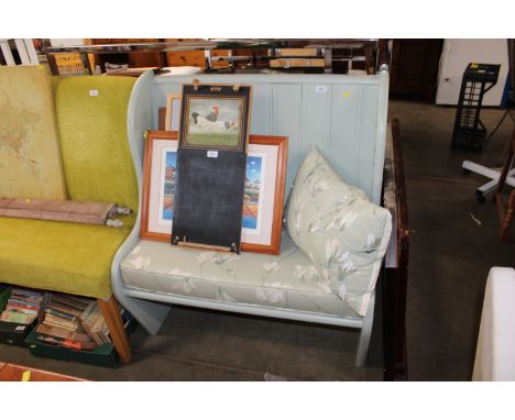 A blue painted bench