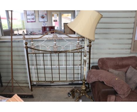 A brass and onyx standard lamp and two headboards