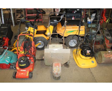 A Pedestrian strimmer/mower with instruction manual 