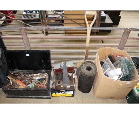 A digging shovel; roll of rubber; wooden box of various workshop tools and a box of various enamel ornaments etc