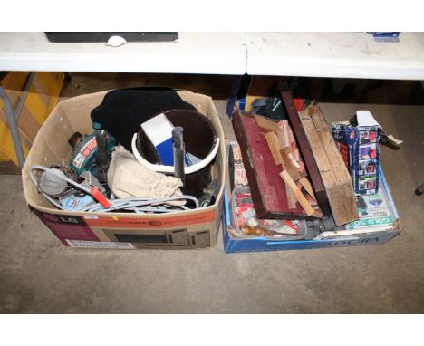 Two boxes containing various workshop equipment to include work lights; paint roller brushes; car floor mats; two wooden carp