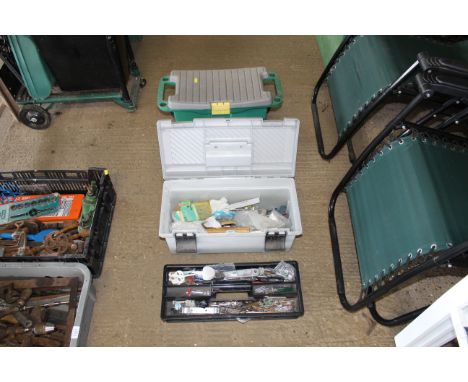 Two plastic tool boxes and contents of various tools; fixings etc