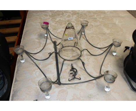 A metal and glass six branch hanging candle light