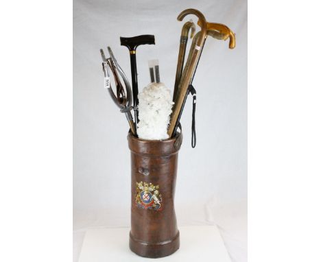 World War Leather Shell Case together with a collection of Walking Sticks, Shooting Stick, etc