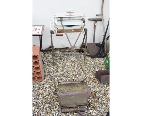 Mid 20th century ' Acme ' Mangle together with a Vintage Push-along Lawn Mowver