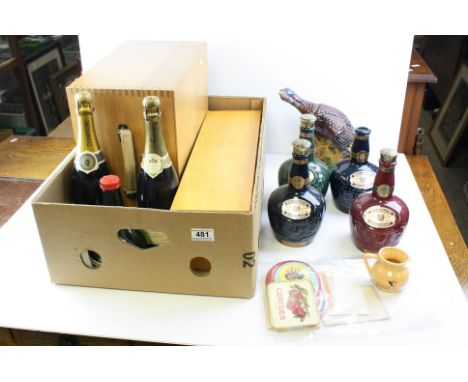 Three bottles of Champagne, four empty Wade whisky decanters, Wild Turkey decanter, two Fortnum &amp; Masons wine boxes, etc.