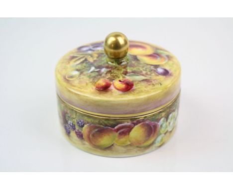 A 20th century porcelain hand painted  trinket box decorated with fruit by former Royal Worcester artist Brian Cox.