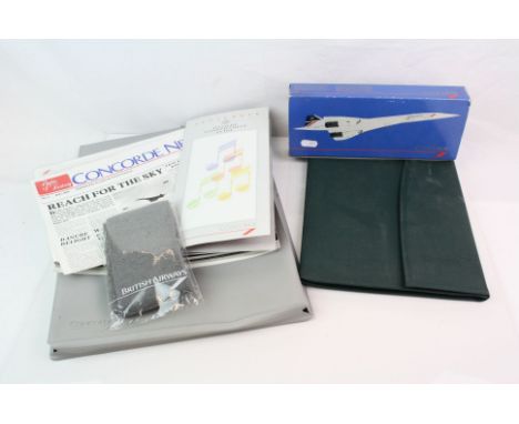 A collection of Concorde collectables to include ephemera, salt &amp; pepper pots and a model.