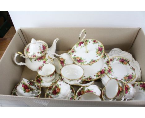 A six place Royal Albert Country Roses teaset to include cakestand and teapot.