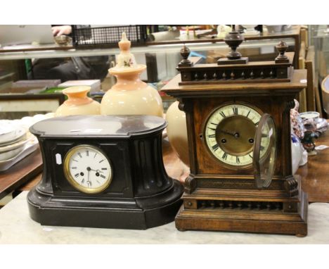 An early 20th century two train movement slate mantle clock together with a similar oak cased clock with galleried and finial