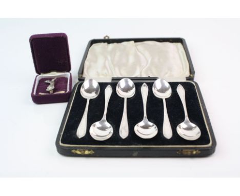 A cased set of six fully hallmarked sterling silver tea spoons together with a silver Royal Air Force Association brooch.