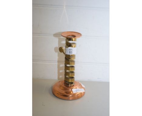 UNUSUAL COPPER AND BRASS ADJUSTABLE CANDLE STICK WITH SCREW THREAD DESIGN