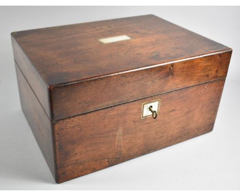 A Late 19th Century Rosewood Fitted Ladies Workbox with Removable Tray, Silver Plate Topped Bottles and Pots, Secret Side Dra