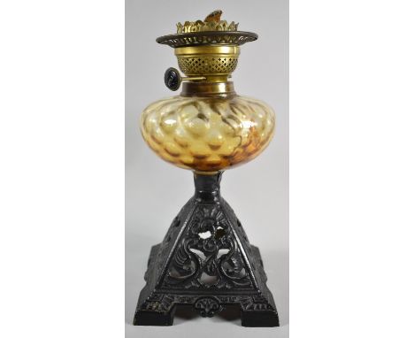 A Late Victorian Cast Iron Based Oil Lamp with Glass Reservoir, No Shade or Chimney 