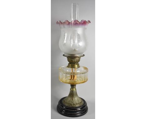 A Late Victorian Oil Lamp with Acid Etched Shade, Glass Reservoir and Brass Support, Complete with Chimney 