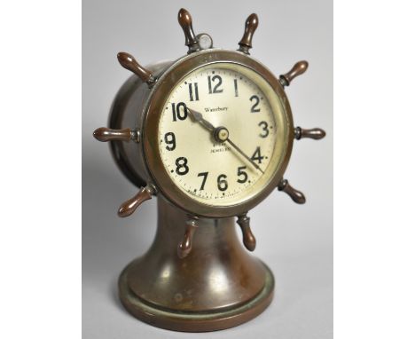 An American 1920's Brass Cased Ship's Wheel Clock by Waterbury Clock Company with Eight Day Jewelled Movement Wound by Turnin