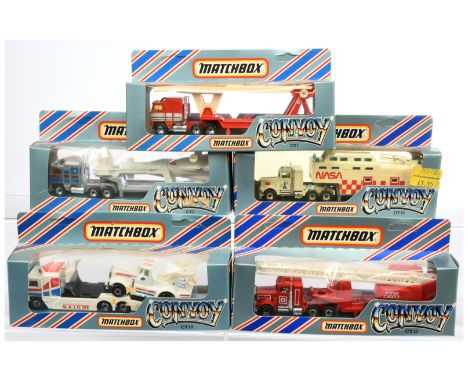 Matchbox Convoy Series a boxed group to include, CY10 Kenworth Racing Transporter, CY1 Kenworth Car Transporter, CY15 Peterbi