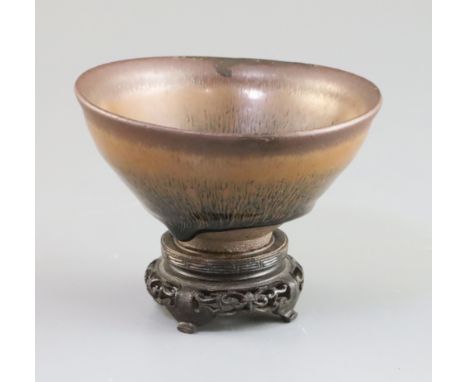 A Chinese Jian type hare's fur bowl, Qing dynasty, D. 12.3cm, wood standProvenance  - The owner and her family lived in Singa