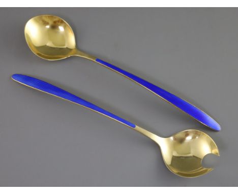 A pair of 1960's Norwegian sterling silver gilt and blue enamel salad servers by David Andersen, with original purchase recei