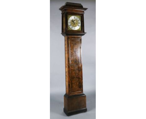 Sam Macham of London. A William and Mary mulberry cased eight-day longcase clock, the 12 inch square brass dial with silvered