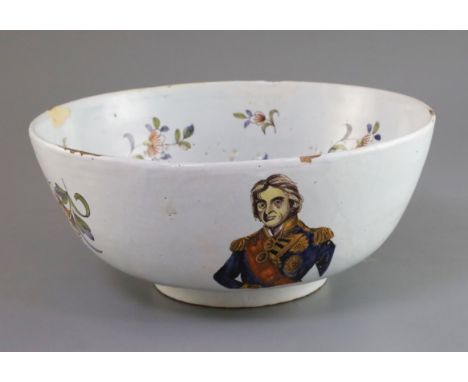 Lord Admiral Nelson. A commemorative Delftware punch bowl, 19th century, painted in polychrome with a portrait of Nelson, as 