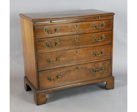 A George III mahogany chest, with brushing slide and four graduated long drawers, on bracket feet, W.2ft 10in. D.1ft 6in. H.2