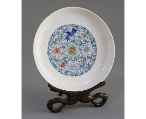 A Chinese doucai dish, Yongzheng square script mark, Qing dynasty or Republic period, painted with central floral medallion, 