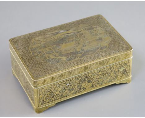 A fine Japanese gold and silver damascened iron box by Komai, Meiji period, the cover decorated with a view of Chureiti Pagod