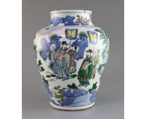 A Chinese wucai vase, Transitional period, 17th century, painted with dignitaries with attendants in a landscape, unglazed fo