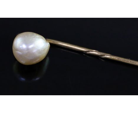 An oval button shaped natural saltwater pearl set stick pin, with Gem &amp; Pearl Laboratory report date 13/5/2016, pearl 8.0