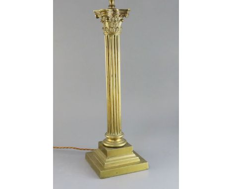 A late Victorian brass corinthian column table lamp, 20in.