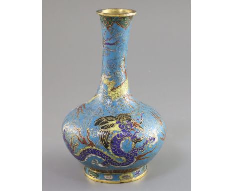 A Chinese cloisonne enamel bottle vase, 18th/19th century, decorated with dragons chasing a flaming pearl on a pale blue grou