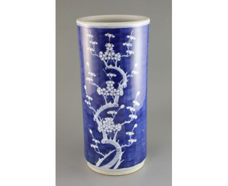 A Chinese blue and white stick stand, c.1900, painted with prunus, unglazed base, H. 47cmProvenance  - The owner and her fami