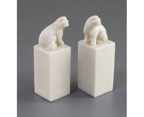PLEASE NOTE Republic period NOT Kangxi, A pair of Chinese blanc de chine seals, Kangxi period, each surmounted by a lion-dog,