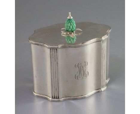 An Edwardian silver serpentine tea caddy with stained carved ivory knop, by James Parkes, with engraved monogram, London, 190