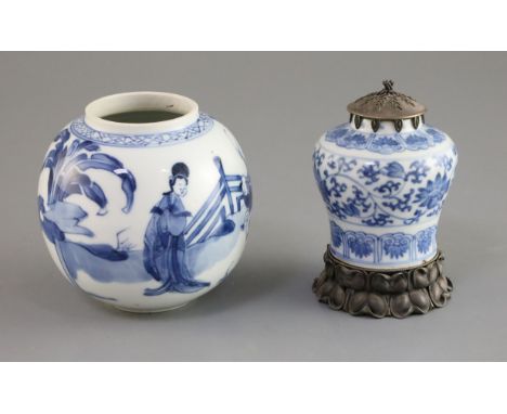 Two small Chinese blue and white jars, Kangxi period, the first of globular form painted with two ladies and a boy in a rockw