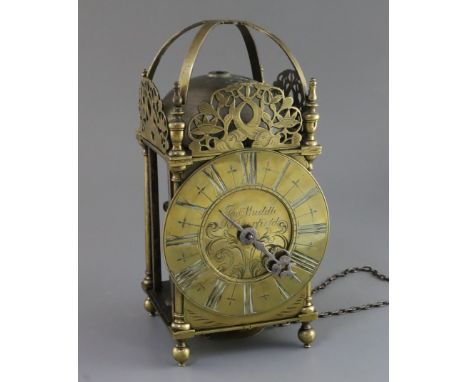 Thos. Muddle of Rotherfield. A 17th century brass lantern clock, with Roman dial and engraved foliate scroll centre, pierced 