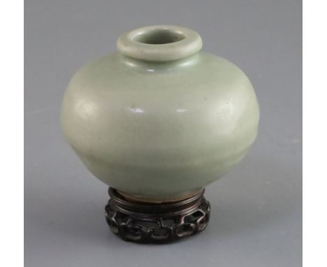 A Chinese Longquan celadon jarlet, Song dynasty, H. 7cm, wood standProvenance  - The owner and her family lived in Singapore 