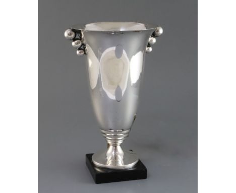 An Art Deco silver plated table lamp, in the manner of Luc Lanel, on black marble plinth, 11.75in.