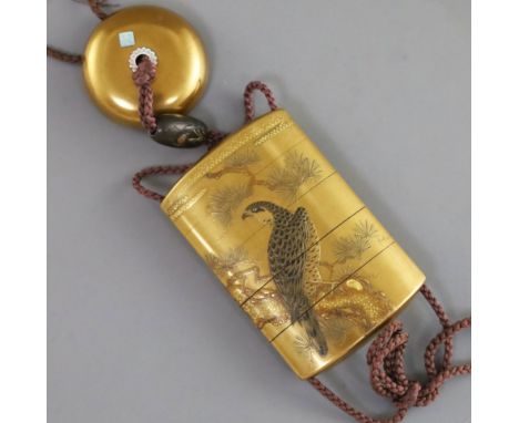 A Japanese four case gold lacquered inro, Meiji period, decorated with a hawk on a pine tree, the base with four character si