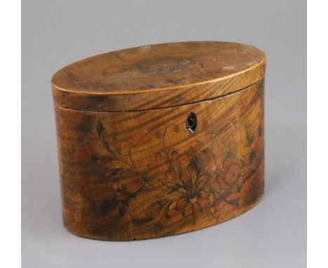 A George III satinwood and marquetry tea caddy, of oval form, decorated with floral sprays with two division interior, width 