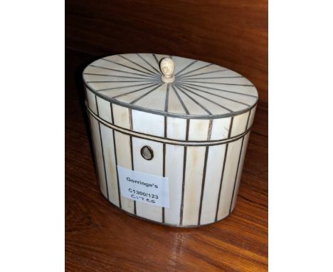 A Regency ivory veneered tea caddy, of oval from with pewter stringing, height 4.7in.