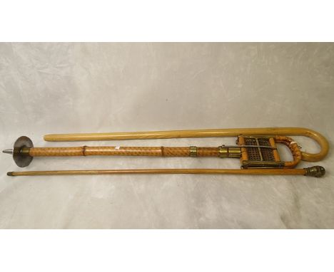 A 19th century brass and bamboo shooting stick, bust mounted walking cane and a walking stick